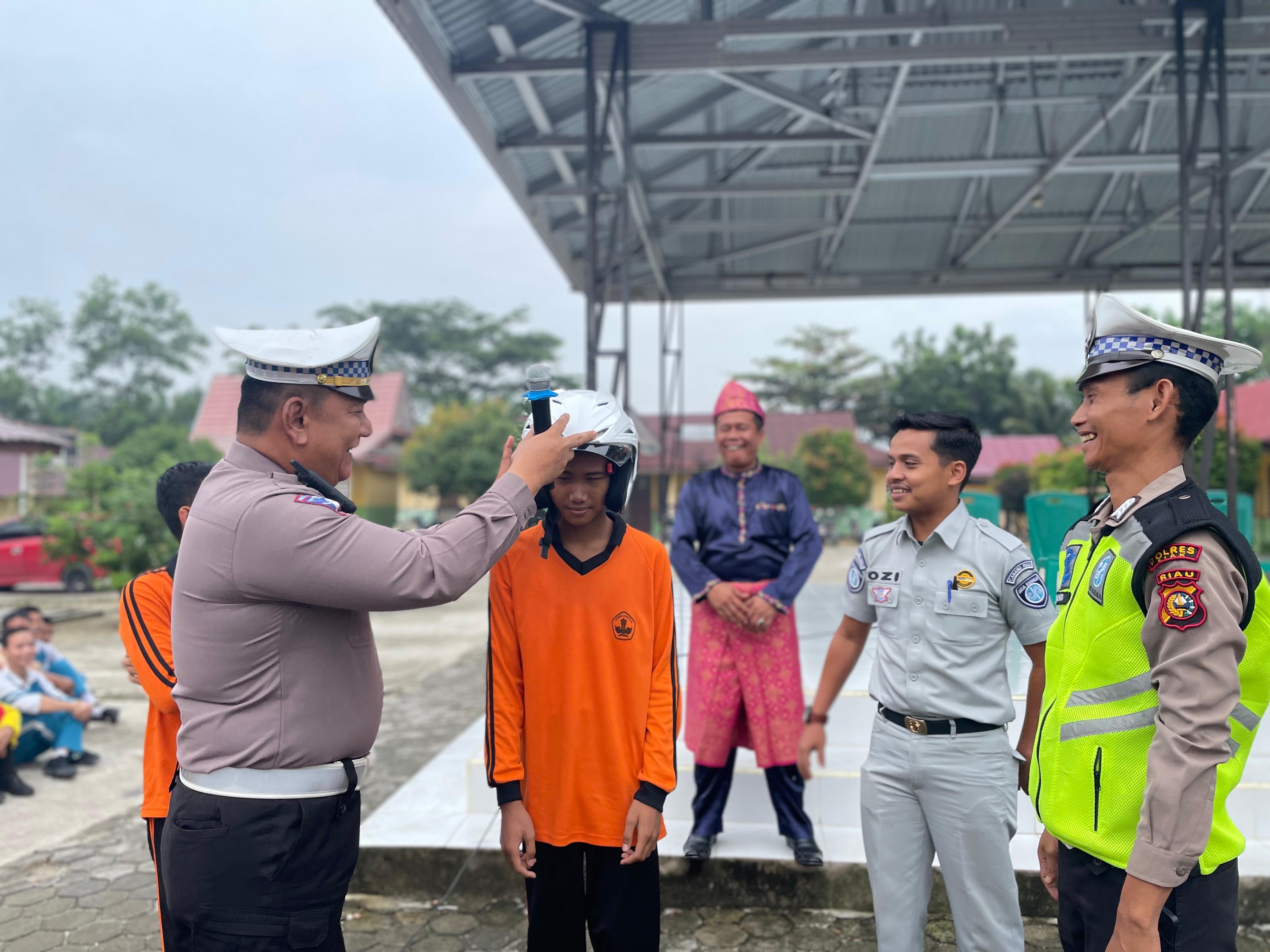 Ciptakan Kamseltibcar Dikalangan Pelajar, Polsek Kandis Gelar Sosialisasi dan MOU di SMAN 1