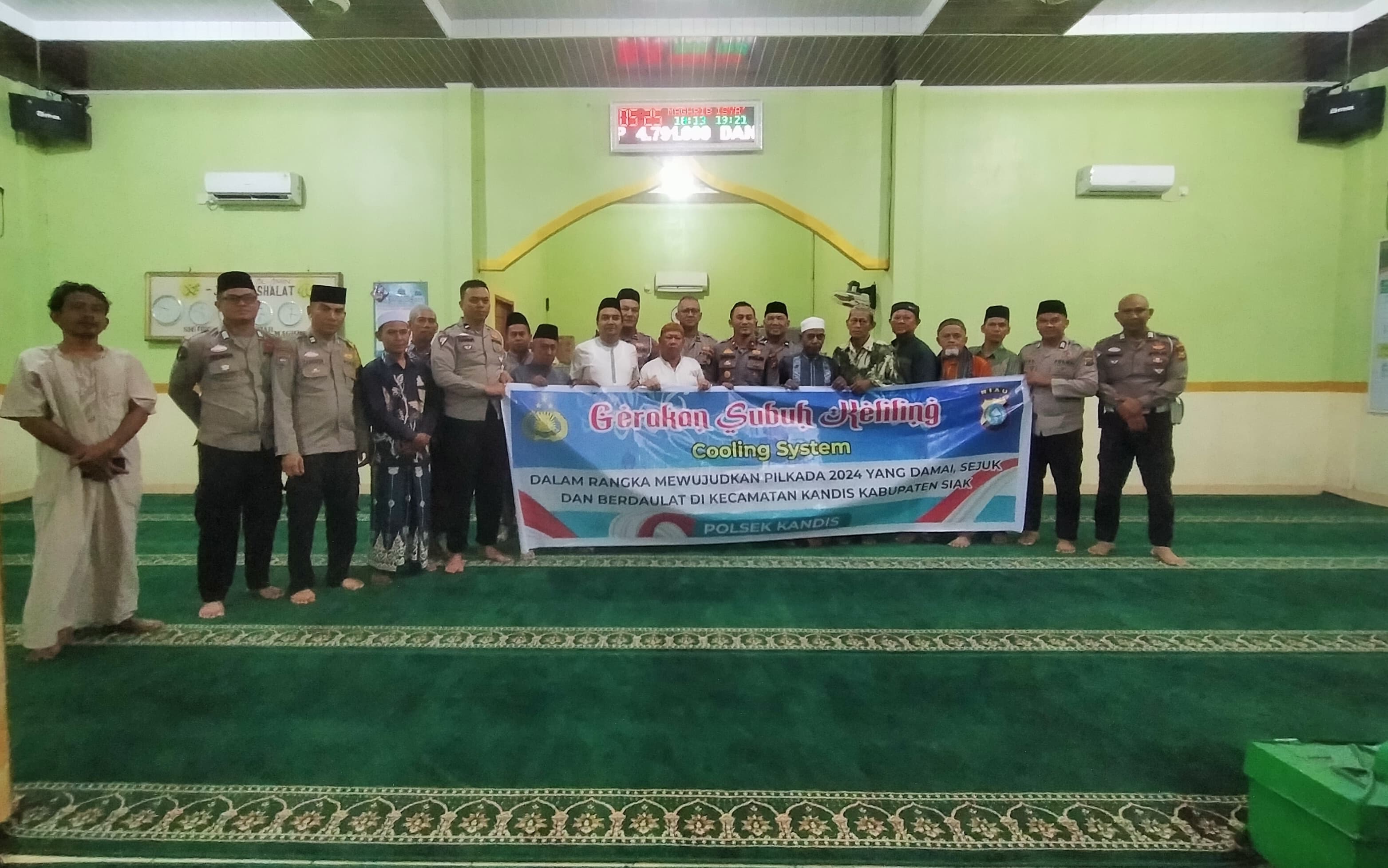 Polsek Kandis Sampaikan Pesan Pilkada Damai Melalui Kegiatan Subuh Keliling