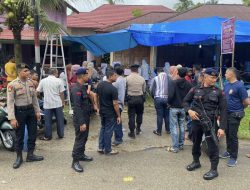 Sinergi TNI-Polri Jaga Kondusifitas Pilkada, Brimob Polda Riau Patroli di Kuantan Singingi