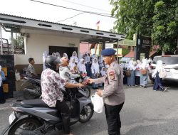 Brimob Polda Riau Ajak Warga Pekanbaru Semarakkan HUT RI ke-80
