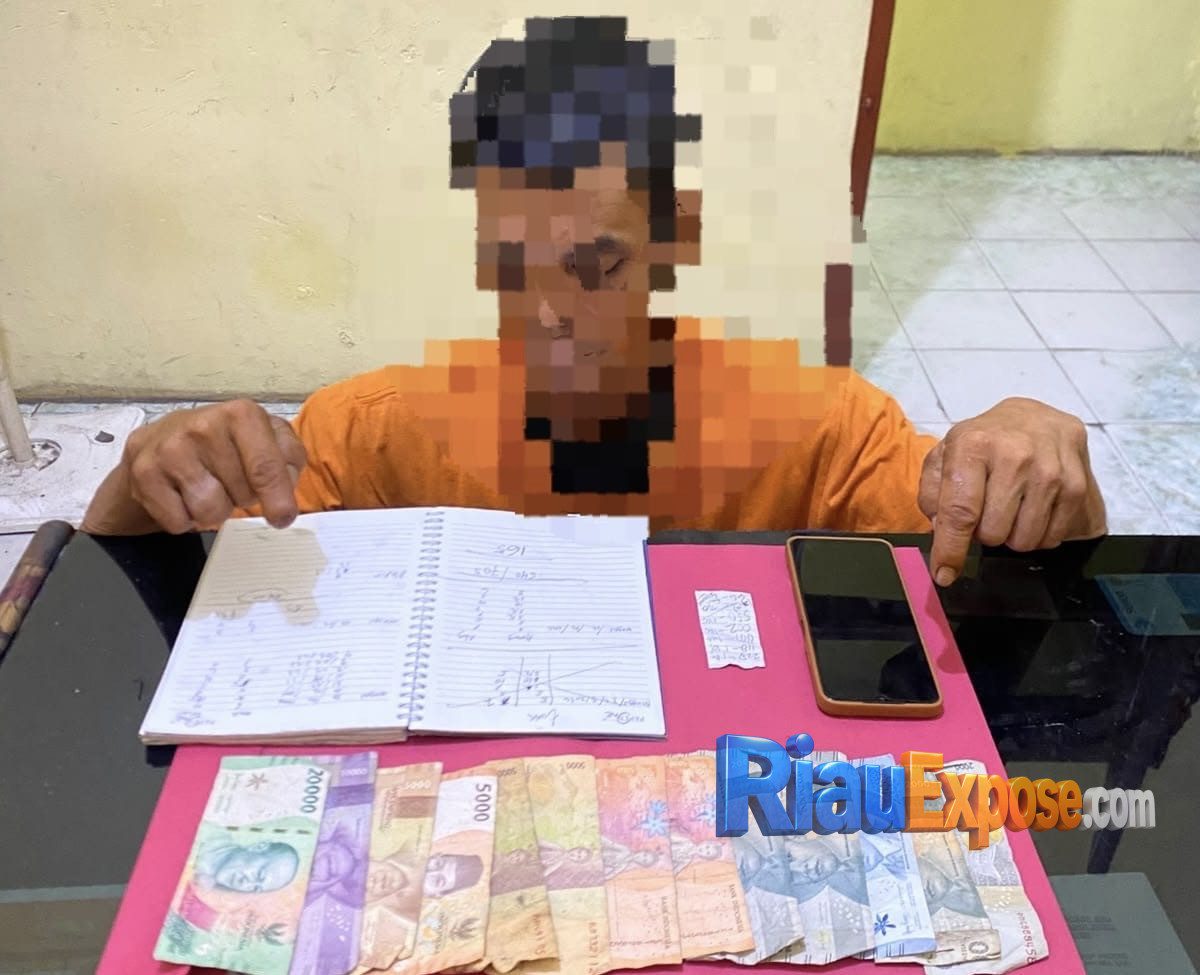 Pria di Lubuk Dalam-Siak Ditangkap Polisi Saat Jalankan Togel Online MAWAR TOTO
